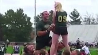 Hoisted boyfriend proposes to cheerleader