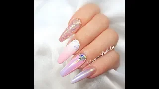 Ombre, aurora pigment nails with glitter encapsulation and babyboomer. Pink white Coffin shape