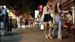Sexy Thai women enjoy eating and shopping on Khaosan Road in Bangkok