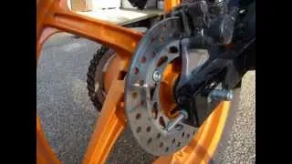 How the CBR 125R chain adjuster mechanism works