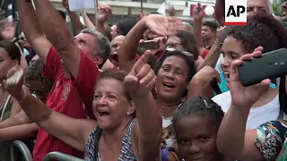 Ex president Lula cheered by supporters in Rio