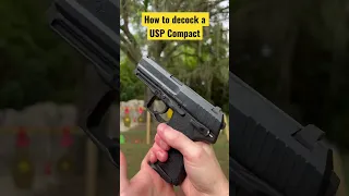 How do you decock a USP Compact pistol? [drop hammer without firing]