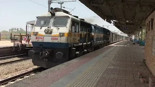 Freight train and 82653 Yesvantpur  Jaipur Suvidha Express both crossing from  vaitarna Indian Rail
