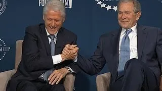 Clinton, Bush Laugh While Launching New Program