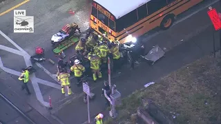 Car crashes into school bus in Lake Worth Beach