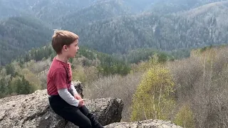 A little patriot: 5-year-old child sings the Russian national anthem in front of the majestic Altai