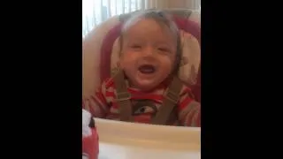 Twin baby boy giggling at Mommy sneezing