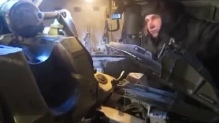 Inside a russian tank/artillery that is firing