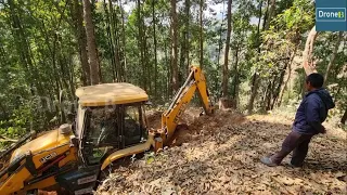 Hilly Narrow Village Road-Backhoe Loader-Cutting and Leveling