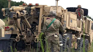 U.S. Military Army Performing Vehicle Recovery Operations