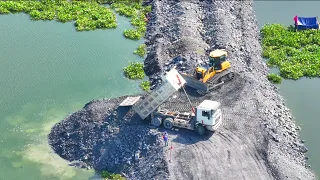 DumpTruck SHACMAN Many Unloading Rock Filling Land With Dozer SHANTUI Push
