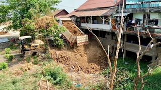 Video of weeding, water next to the house or under the house to fill a large space By Bulldozer.