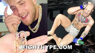 JAKE PAUL CLOWNS CONOR MCGREGOR WITH $100K "SLEEPY MCGREGOR CHAIN" HOURS BEFORE CRASHING UFC 264