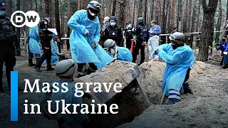 Ukraine: Izium mass grave shows signs of torture, starvation | DW News