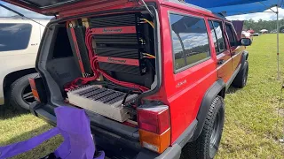 12 INCH SUBS FLEXING TIRES ON THIS JEEP