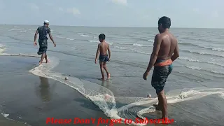 Net fishing in the sea by Small boy | Cast net fishing