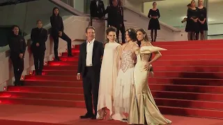 Demi Moore, Dennis Quaid and Margaret Qualley arrive at the Cannes premiere of 'The Substance'