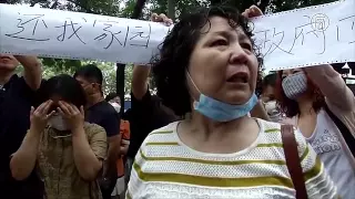 Жители Тяньцзиня требуют компенсаций (новости)
