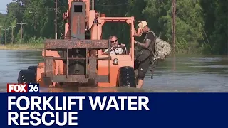 Heavy flooding in Conroe, man had to be rescued by forklift