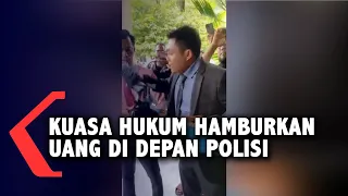 Viral! Aksi Pengacara Hamburkan Uang 40 Juta Di Depan Polisi