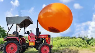 Biggest Monster Balloon VS Tractor - Experiment