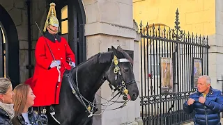 STUPID IDIOT French tourist threatens to PUNCH the King's Horse!