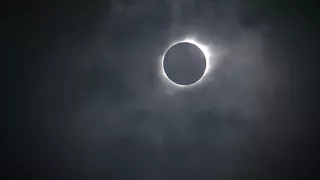 Total solar eclipse emerges from behind clouds in Nebraska