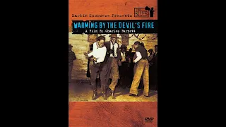 THE BLUES: WARMING BY THE DEVIL'S FIRE