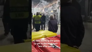 AZ Alkmaar fans clash with West Ham players and attacked their families causing a chaos scene.