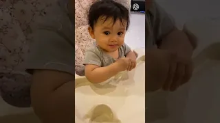 Cute baby loves food