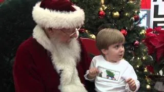 Kids tell Santa Claus what they want for Christmas