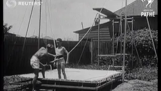 Divers train with new device (1936)