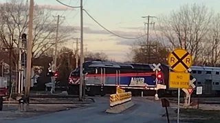 Metra Train going Inbound passing the Spaulding Junction, IL on a Nice Sunset.