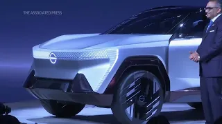 Car brands unveil new models at China show