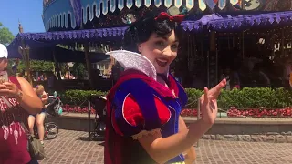 Snow White leads the 7 Dwarfs through Fantasyland! // Disneyland