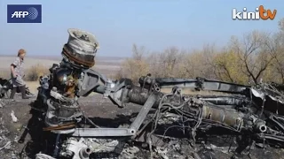 Dutch return to MH17 crash site as search resumes