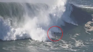 HUGE NAZARE - Surfer takes 5 waves on the head before getting rescued