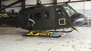 Chopper Spotter with Prototype Arms Moving Huey