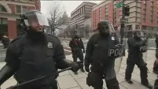 Police clash with protesters during Inauguration