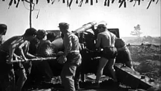 U.S. Marine Battery firing 155mm howitzer during battle of Okinawa in World War I...HD Stock Footage