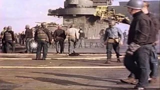 Damage on USS Enterprise after it was attacked by a Japanese suicide aircraft whi...HD Stock Footage