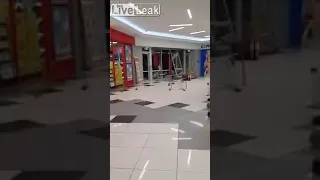 Psycho kids destroy store and throw glass at security.