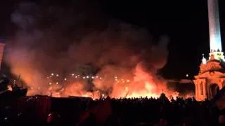 Ukrainian protesters sing the national anthem during clashes, Kyiv, Feb 18, 2014