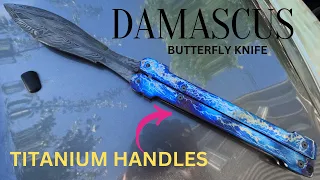 Damascus Butterfly Knife with Titanium handles.