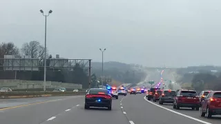 Officer O’Connor escorted to the airport.