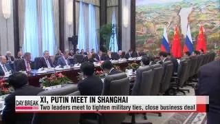 Russia, China pledge closer ties as joint military drills begin