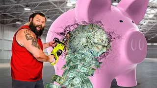 Giant Piggy Bank vs World's Strongest Man!