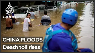 Flood toll rises in central China, as tens of thousands evacuated