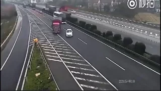 Car missed it exit and causes two semi trucks to CRASH
