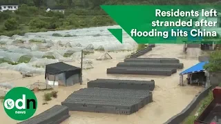 Residents left stranded after flooding hits China